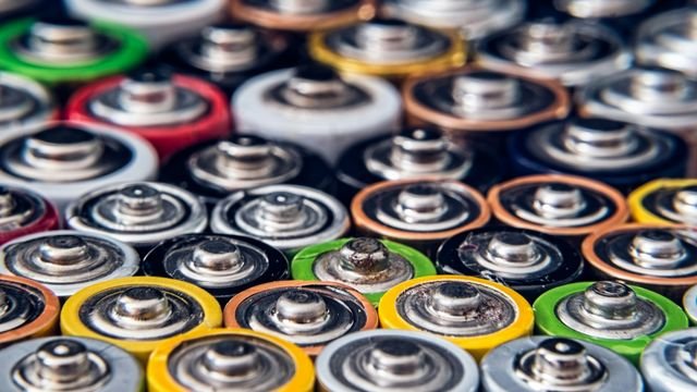 Molecular Stability Barriers Restrict Organic Redox Flow Battery Grid Storage